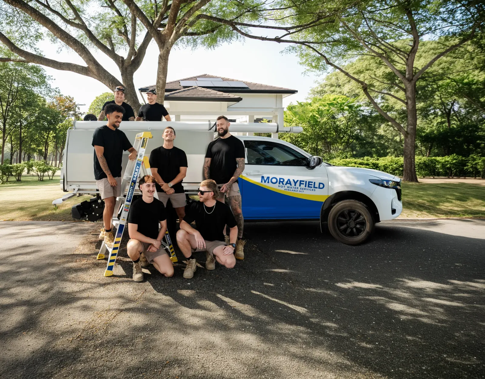 Morayfield Hot Water Services team and ute